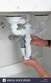 clogged kitchen sink stock photo