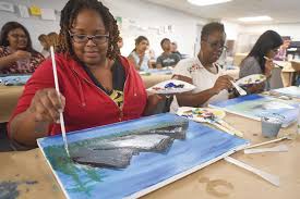 One person climbed on the roof and unfurled a banner. Painting With Purpose American Libraries Magazine