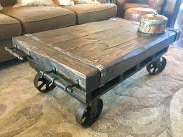 Rustic coffee table with wheels to creates an unusual living room decor. Rustic Factory Cart Coffee Table From Bacs Designs Rustic Coffee Tables Cart Coffee Table Industrial Style Coffee Table