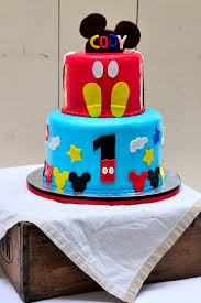 With a #2 pastry tip toothpicks for mickey mouse: Mickey Mouse Cake Haniela S Recipes Cookie Cake Decorating Tutorials