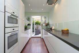 This gallery showcases modern white kitchen design ideas with both style and functionality. White Gloss Galley Kitchen Minimalistisch Kuche London Von Lwk London Kitchens Houzz