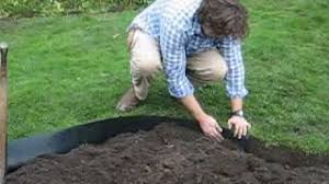 This border edging is rot proof and maintenance free. How To Install Recycled Plastic Lawn Edging Roll Around Flower Bed Enjoy Neat Border And Lawn Edge Youtube