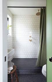 A creamy white vanity is paired with a gray hex floor tile in this bathroom by blake shaw homes. 60 Stylish Hexagon Tiles Ideas For Bathrooms Digsdigs