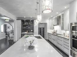 The farmer's sink is by waterworks and the countertop is from caesarstone. Modern White Grey Kitchen Design Oakville Modern Kitchen Toronto By Kitchen Land Houzz Au