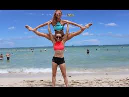 Rybka twins merch has landed and we can't wait to share it with you! Yoga Challenge Miami Beach Sam And Teagan Yoga Challenge Partner Yoga Poses Acro Yoga Poses