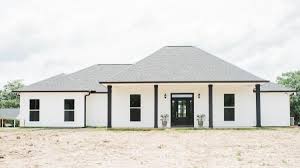Rooms are often arranged on either side of a central hallway with a kitchen at the back. Acadian Architectural Style Cretin Townsend Homes Custom Homes Built On Your Property