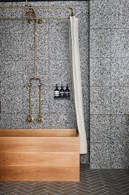 A shower dam divides the shower from the bathroom flooring to keep water contained and allows for two different flooring materials, but removing it and using the same tile by the vanity and in the shower gives a sleek look, she notes. 48 Bathroom Tile Ideas Bath Tile Backsplash And Floor Designs