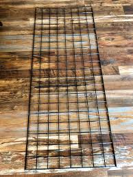 Tighten screws in place and repeat with all sections of pegboard. Nerf Gun Wall Reno Dads