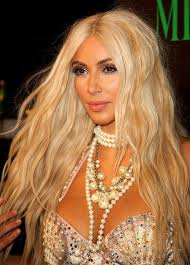 For years, the world has wondered if kim kardashian is a wizard; Kim Kardashian Goes Blonde With A Fishtail Skirt Pearl Necklace