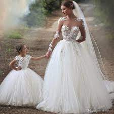 Check spelling or type a new query. Grosshandel Schone Mutter Tochter Brautkleid Sheer Neck Long Sleeves Brautkleider Ballkleid Tull 2019 Prinzessin Vestido De Noiva Brautkleid Von Likebridal 105 82 Auf De Dhgate Com Dhgate