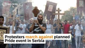 Protesters march against planned Pride event in Serbia - YouTube