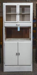 They sure have a lot of things in common, don't they? Vintage Kitchen Pantry Cabinet The K And B Auction Company