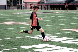Big Red boys come up short, 5-3, in Friday Night Futbol to open season