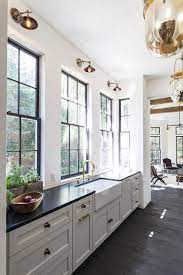 Check out the 21 most attractive ideas that will improve the look of the furniture as well as making the cooking area looks fantastic here! White Kitchen Cabinets With Black And Gold Hardware Transitional Kitchen