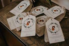Each favor consists of a tiny silver bell and an attached customized gift tag printed with a love poem to encourage guests to ring the bell if they want to see. 20 Personalized Wedding Favors Your Guests Will Love