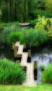 A Strange But Nice Designed Bridge Above A Gasrden Pond I Think It S A Beautiful Idea Backyard Landscaping Designs Contemporary Garden Design Garden Design