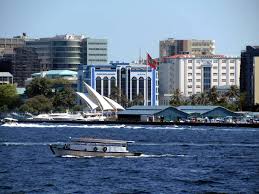 The National Flag Of The Maldives Flies Above Republic Square In The Center Of Male The Large White Awnings Shelter The Presidenti Maldives Indian Ocean Ocean
