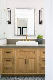 Photo by rachel reider interiors. Gray Chevron Floor Tiles Wood Washstand With Gray Quartz Countertop And A Rectangular Vessel Sink Grey Countertops Grey Bathrooms Quartz Bathroom Countertops