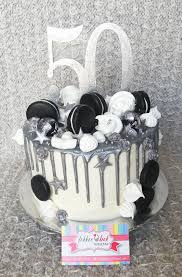 You could end up with something really cool. 50th Birthday Cake With White Buttercream Frosting And Silver Chocolate Ganache Drips Topped With Black Drippy Cakes 60th Birthday Cakes White Birthday Cakes