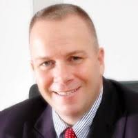 I signed my first coaching contract at 18 years old in 1982, earning $3700  to coach the track team at Forest Park Middle School in my hometown of  Cincinnati, Ohio.