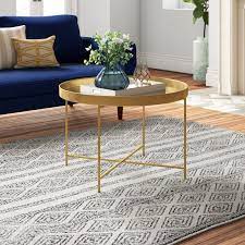 Round tables are a small space savior, and this side table could easily be repurposed as a coffee table for a super narrow space. The Best Coffee Tables For Small Spaces Apartment Therapy