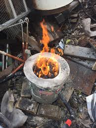 I Placed The Crucible On Top Of A Few Briquettes Of Charcoal Then Filled In All Around It With More Charcoal Us Aluminum Cans Charcoal Lighter Lighter Fluid