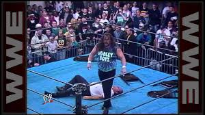 That's one of the best and most powerful images in wrestling to me. Sandman Oww