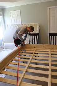 This diy upholstered storage bench is perfect for adding storage to the end of the bed and also makes a nice place to sit and put on shoes before leaving the house. Diy Upholstered Platform Bed Diy Platform Bed Diy Bed Diy Bed Frame