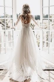 This soft and luxurious lace wedding dress features a sleek silhouette that epitomizes timeless beauty and effortless grace. Graceful A Line Cheap Lace Long Sleeve Wedding Dresses Bridelily