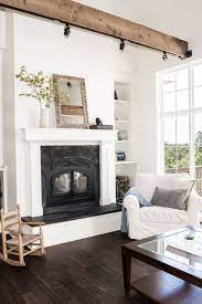 Balancing this expanse of floor, white cabinetry and walls keep the dark wood from overpowering the room and ensure the room stays open and bright. Residential Listings Middleburg Real Estate Atoka Properties White Walls Living Room Dark Wood Living Room Dark Wood Floors Living Room