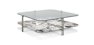 With an octagonal design, the glass top nestles within the bronze supports. Biplane Coffee Tables Cattelan Italia