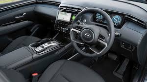 Hyundai defends 2021 tucson's outdated engines: Hyundai Tucson Hybrid Interior Dashboard Comfort Drivingelectric