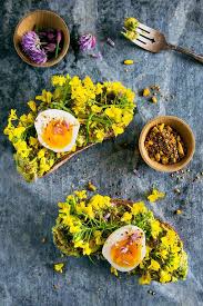 27 Edible Flower Recipes To Freshen Up Your Spring Menu The View From Great Island Edible Flowers Recipes Flower Food Soft Boiled Eggs