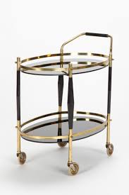 Italienischer Servierwagen Aus Messing Und Schwarzem Glas Aus Den 1960er Jahren Beine Mit Lackiertem Holz Eingekleidet Home Treasures