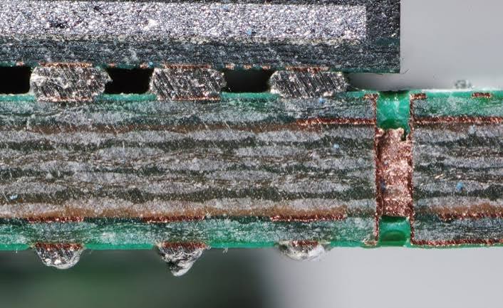Cross-section micrograph of a multilayer FR4 via