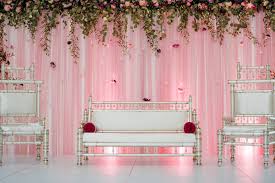 This Pakistani Wedding Showcases A White Stage Flooring Blush Draped Backdrop With Glass Beaded C Mandap Decor Wedding Stage Decorations Wedding Rentals Decor