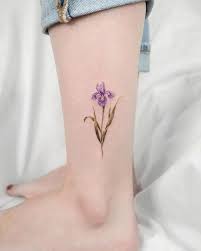 125 Best Flower Tattoos Tattoo Ideas In 2021 Iris Tattoo Tattoo Designs And Meanings Iris Flower Tattoo