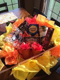 While making the s'mores gift basket, keep in mind the recipients dietary limits. Fire Pit Backyard Bonfire Gift Basket Good For A Silent Auction Or Fundraiser Birthday Gift Baskets Homemade Gift Baskets Bonfire Gift