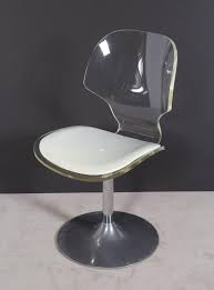 Smokey black lucite shell (with arms) chair with a chrome tulip base dimensions: Hill Manufacturing Lucite Chair On Aluminium Tulip Base At 1stdibs