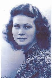 Phyllis Latour was born in April 1921 in South Africa. Her father was a  French doctor, and her mother, Louise, was a British citizen living there.  In 1941, she moved to England