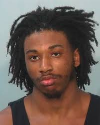 Suspect in 3 slayings has clean past