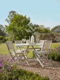 This set incorporates this beautiful wood with a timeless aesthetic, ergonomic chairs with denim seat slings and a roomy table that's likely to last you a lifetime. English Country Garden Furniture Trend Why Yesterday Is The New Tomorrow Avenue15 Co Uk