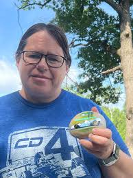 Found this half buried in the ground, near Buckhorn, ON, Canada There's  definitely quartz in there, but also non-magnetic black deposits. Very  irregular in shape, but has layers visible