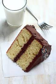 Classic Yellow Birthday Cake With Nutella Buttercream Frosting Baker By Nature Recipe The Joy Of Baking Yellow Birthday Cakes Delicious Desserts