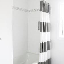 Using large tiles in your bathroom shower is easy, and you can avoid numerous tile cuts. Stacked 4x16 White Subway Tiles Design Ideas