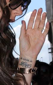 The message down victoria beckham's neck reads, i am my beloved's and my. Victoria Beckham And Her Disappearing Tattoos