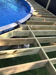 How To Deck All The Way Around An Above Ground Pool Wood Pool Deck Pool Deck Plans Backyard Pool Landscaping
