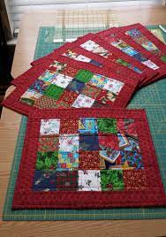 It makes use of thick yarn so that it is durable. Scrappy Christmas Quilted Placemats Placemats Patterns Quilted Placemat Patterns Place Mats Quilted