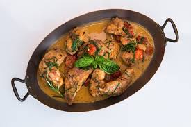 Il coniglio alla stimpirata è un saporito e succulento secondo piatto di carne, arricchito con patate, pinoli e uvetta. Coniglio Alla Stimpirata Recipe Great Italian Chefs