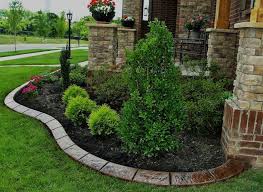 I have a concrete driveway (normal 2 car poured driveway) which is cut vertically (90 degrees) about 2.5 inches above the street. Landscape Edging Shelby Township Rochester Hills Troy Mi Zlm Services Llc
